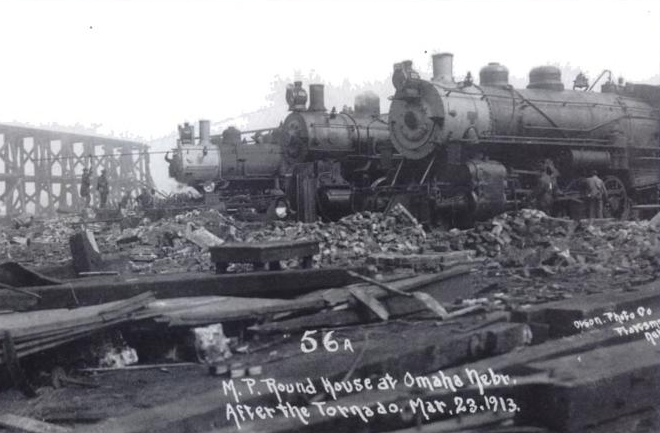 Before the 1913 Easter Sunday tornado, these locomotives were parked IN the Missouri Pacific Railroad roundhouse near North 16th and Locust Streets.